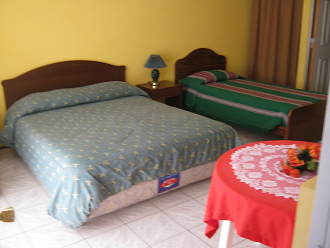Hostal Villarica, ein hergerichtetes
                        Zimmer