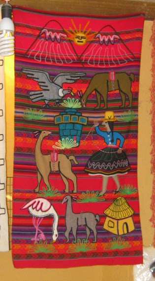 Calle Col�n, centro artesanal,
                                tejido rojo