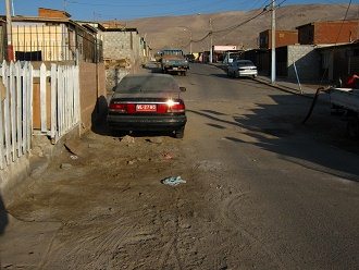 Cerro Chu�o, casas y arena muerta