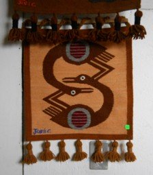 Tejido con un dise�o mostrando dos
                              gansos