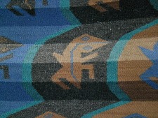 Tejido con dise�o de
              lagartos, un lagarto marr�n, primer plano