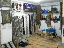 Wandteppiche und Webapparat zum
                              Aufwickeln der Wolle