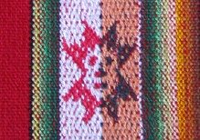 Tischdeckenmuster-Detail, Sonne
                                  in Rot