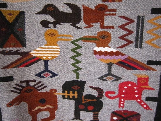 Kalendermotive: Zwei V�gel fressen
                          W�rmer; ausserdem sind oben ein Eichh�rnchen
                          und ein Murmeltier sichtbar, und unten ein
                          Farruga [?] sowie ein Puma oder Tiger, und
                          rechts ein roter Elefant [?]