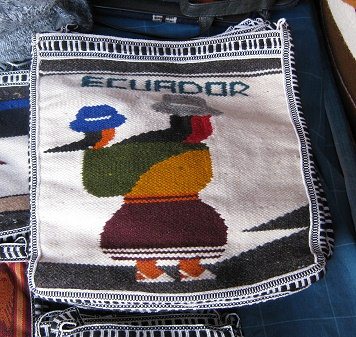 Gewebte Tasche mit einer Frau,
                                    die ihr Kleinkind auf dem R�cken
                                    tr�gt