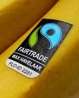 Fair-Trade-Label auf Bananen, z.B.
                              von der Organisation "Max
                              Havelaar"