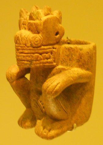 Columbia's
                              Calima Culture: alien god with adog's nose
                              02 with circular eyes and triangular
                              teeth