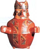 Wari: Cermica
                        representando un hombre con 4 caras