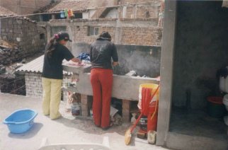 Washing clothes on the roof, Pamela and Shirley 01