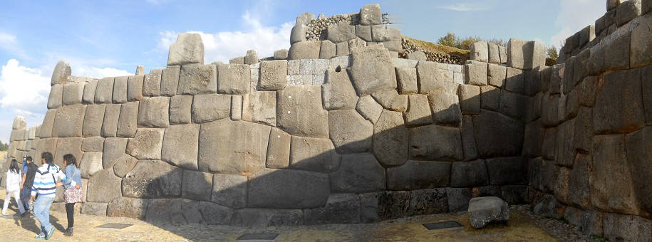 Cusco, Sacsayhuam�n, terrace 1, wall with almost rectangular stones and with a flower design - panorama photo 04
