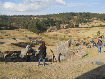 Cusco, Sacsayhuam�n, terrace 1, the view to the exit (stairs downwards) and the view to the meadows, forests and to the toilet house