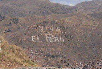 Sacsayhuam�n (Cusco), terrace 4, view to writings on a mountain: "Long live Peru!" ("Viva el Per�") - zoom
