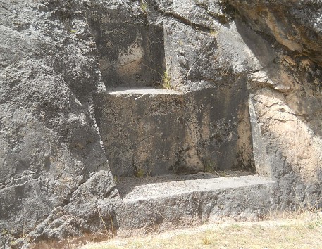 Details from the rock of stairs and thrones "Chinchana grande" part 2 (right): half lateral view of the throne, zoom