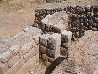Area of the rock of stairs "Chinchana grande": giant stone with rectangular cut - perfect Inca wall