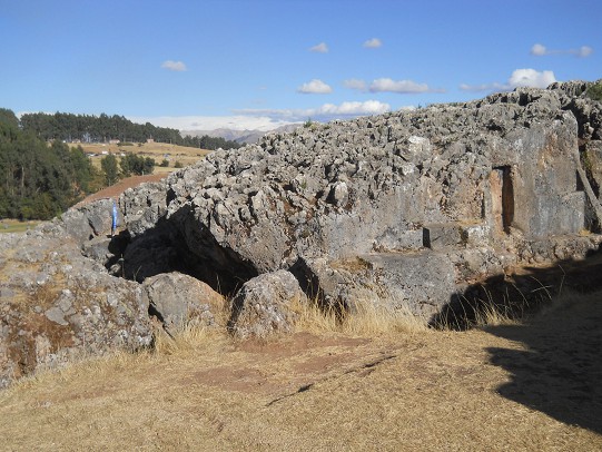 Cusco Sacsayhuam�n, even more mysteries: rock walls of the corridor in black and red with niches and thrones, panorama 03