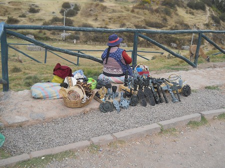 Cusco Sacsayhuam�n, peddlers near the big parking with figurines as a memory