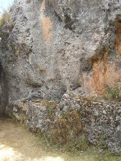 Cusco Sacsayhuam�n, Zone X (Laq'o, Laco, Moon Temple), a bench cut from a black and red rock 01