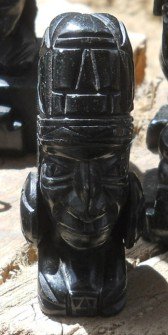 Handicraft workshop in Cusco
                    Sacsayhuam�n: black figurines 03, extraterrestrial:
                    they were godS