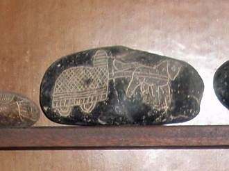 And here there is a stone with
                                    a war chariot with a horse 01