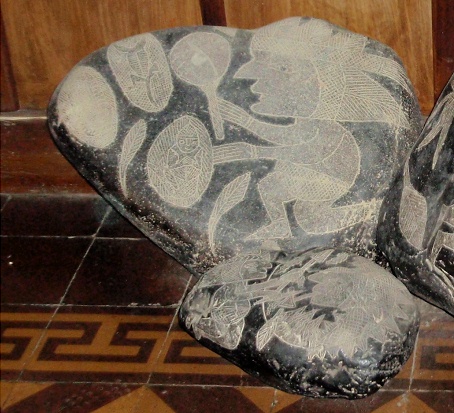 The wise man with it's magnifying glass
                            and the eggs of the creation with a lizard
                            and a man in them