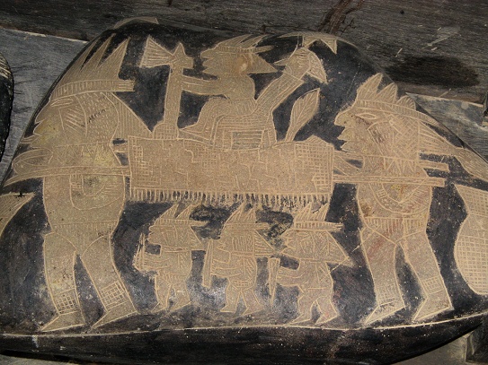 Wise men carrying a litter with a wise
                            with a hatchet