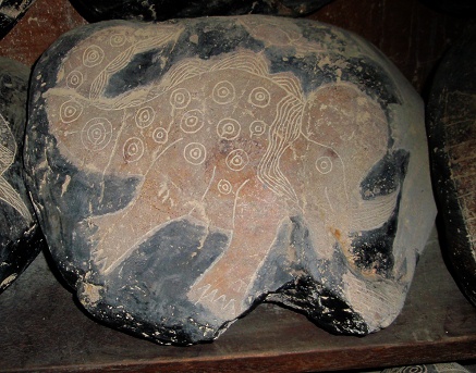 Dinosaur (mixture between unicorn and
                            Stegosaurus) with circles on it's body