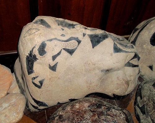 Un dinosaurio come
                  un lagarto, y hay un sabio