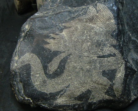 A wise man with snakes, close-up