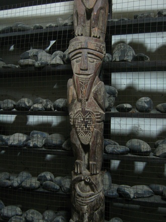 Wooden Inca stele, detail 01 with a face