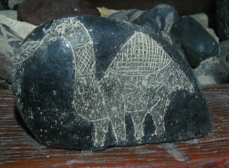 Dinosaur with a pyramid