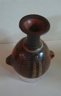 Ceramic jug of Inca culture
                                    with geometric designs