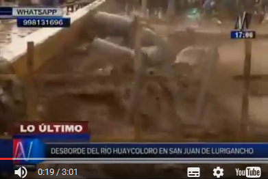 Lima, puente Huaycoloro, el r�o
                            lleva cilindros que saltan al puente
